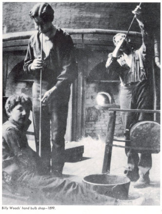 Billy Woods blowing a glass light bulb in the Wellsboro PA glass factory - history of glass making in Wellsboro PA